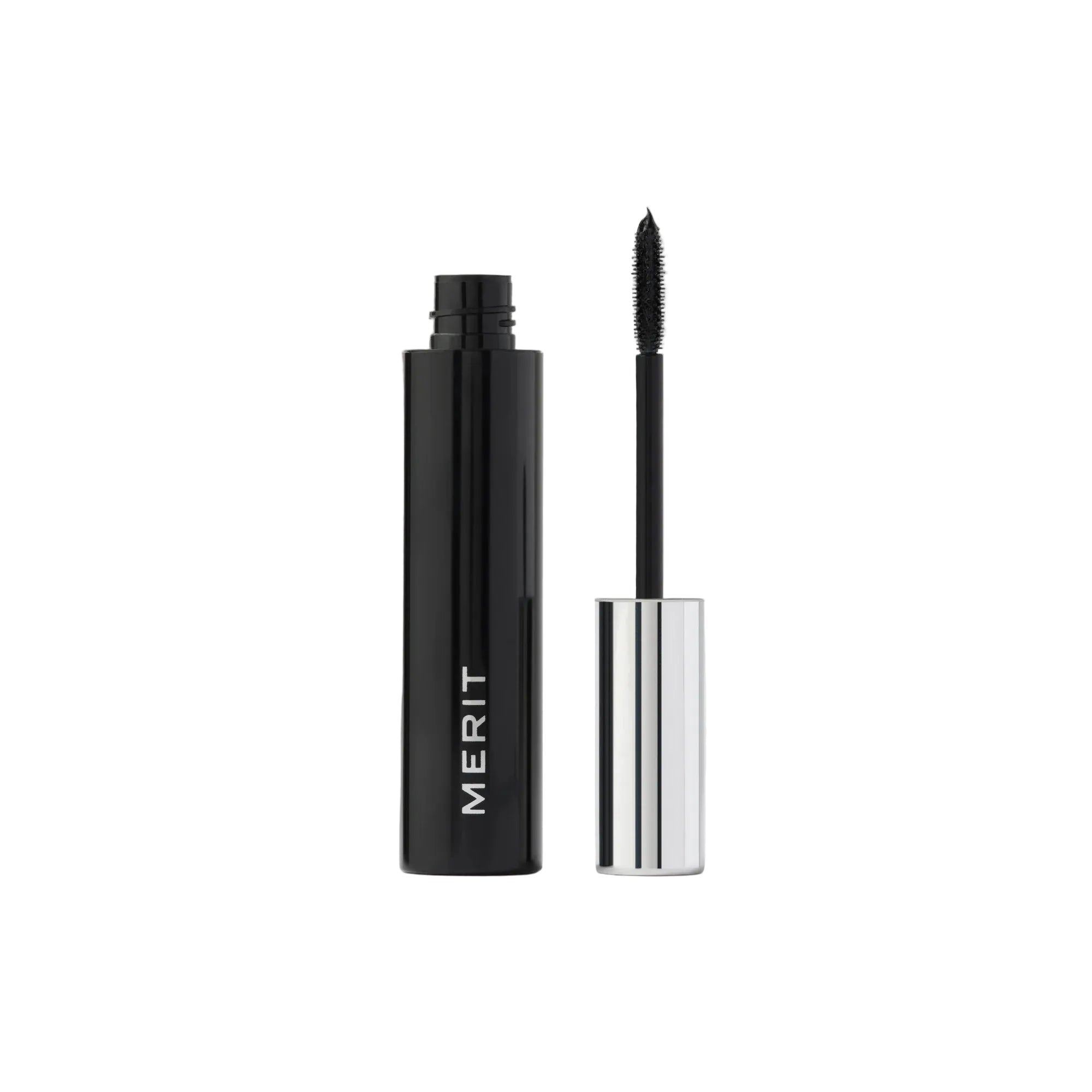Black mascara with silver cap on a white background, featuring the 'Merit' brand.