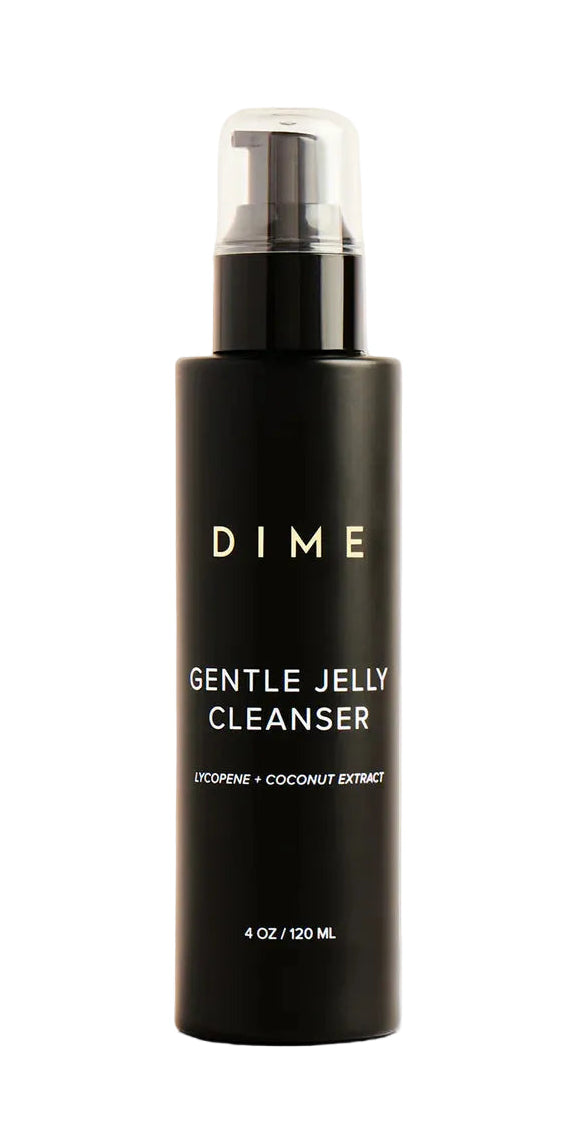 Black bottle of DIME Gentle Jelly Cleanser on a beige background